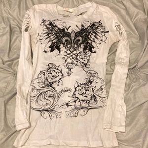 Long sleeve sexy ripped shirt.